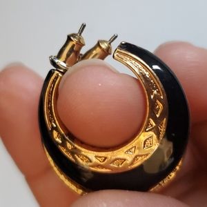 Black and gold fashion earrings.